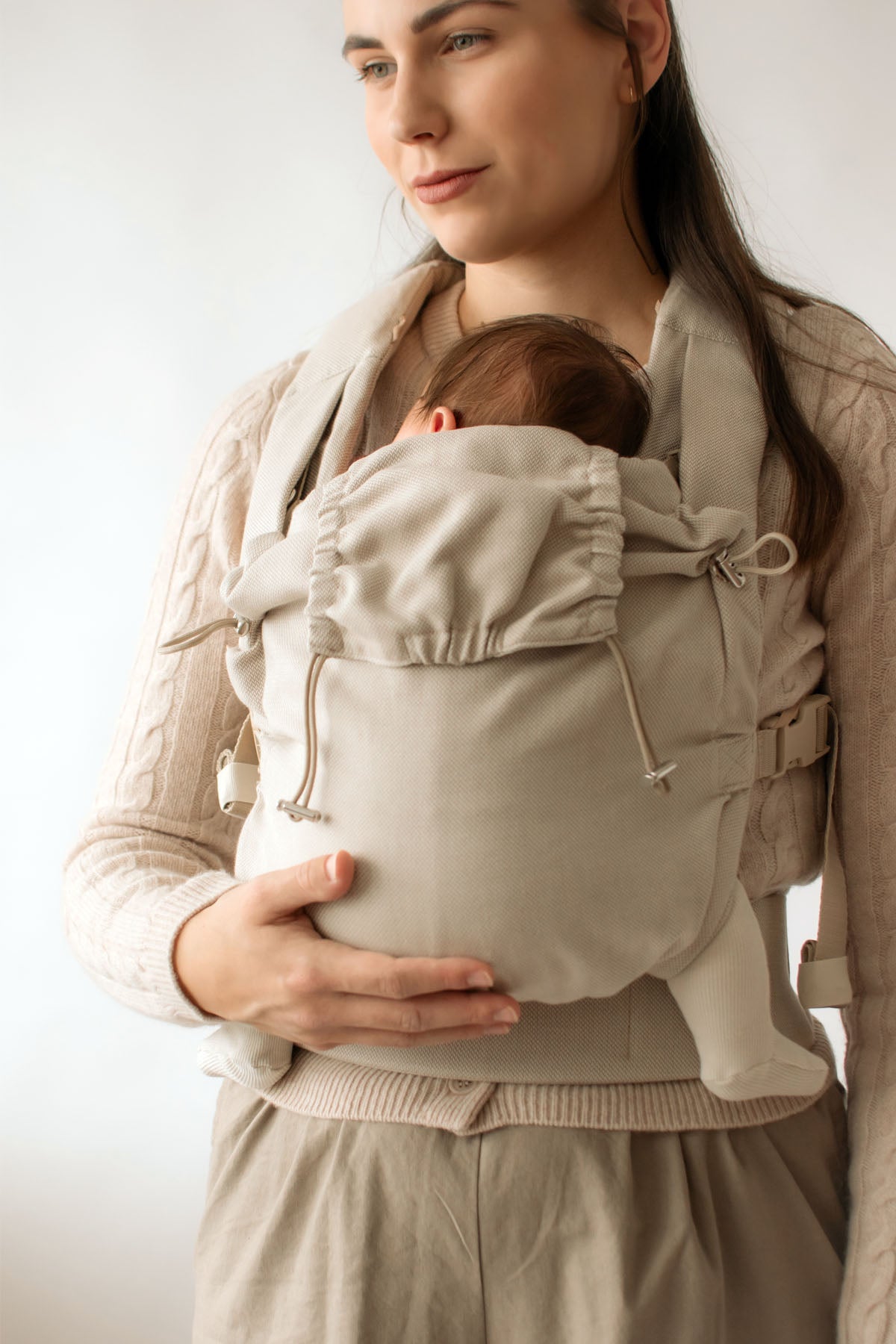 nosítka pro novorozence v krémové barvě
